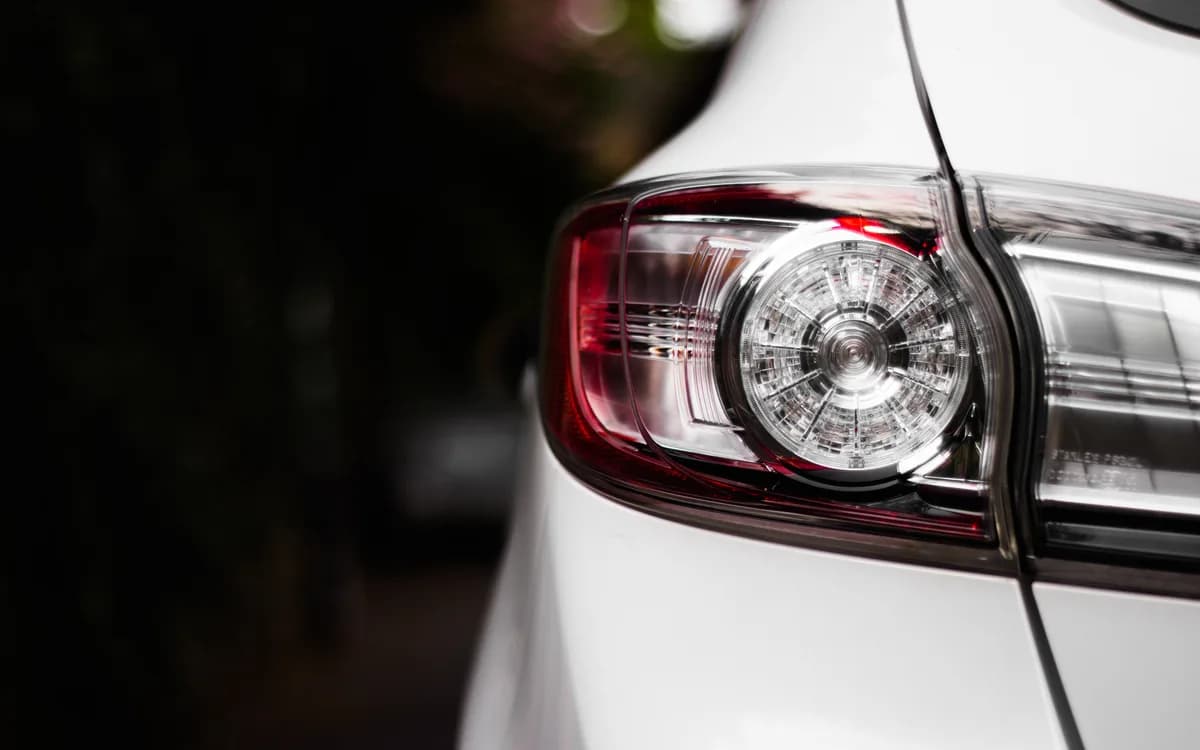 Close view of a vehicle rear panel, light and bodywork