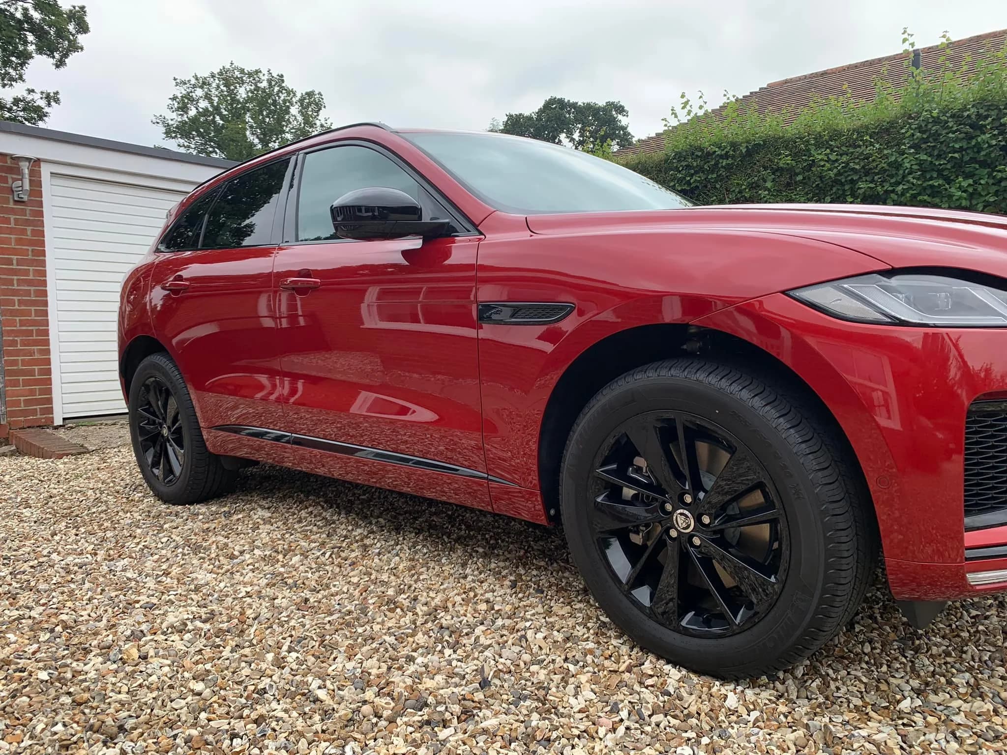 Red car photographed outdoors