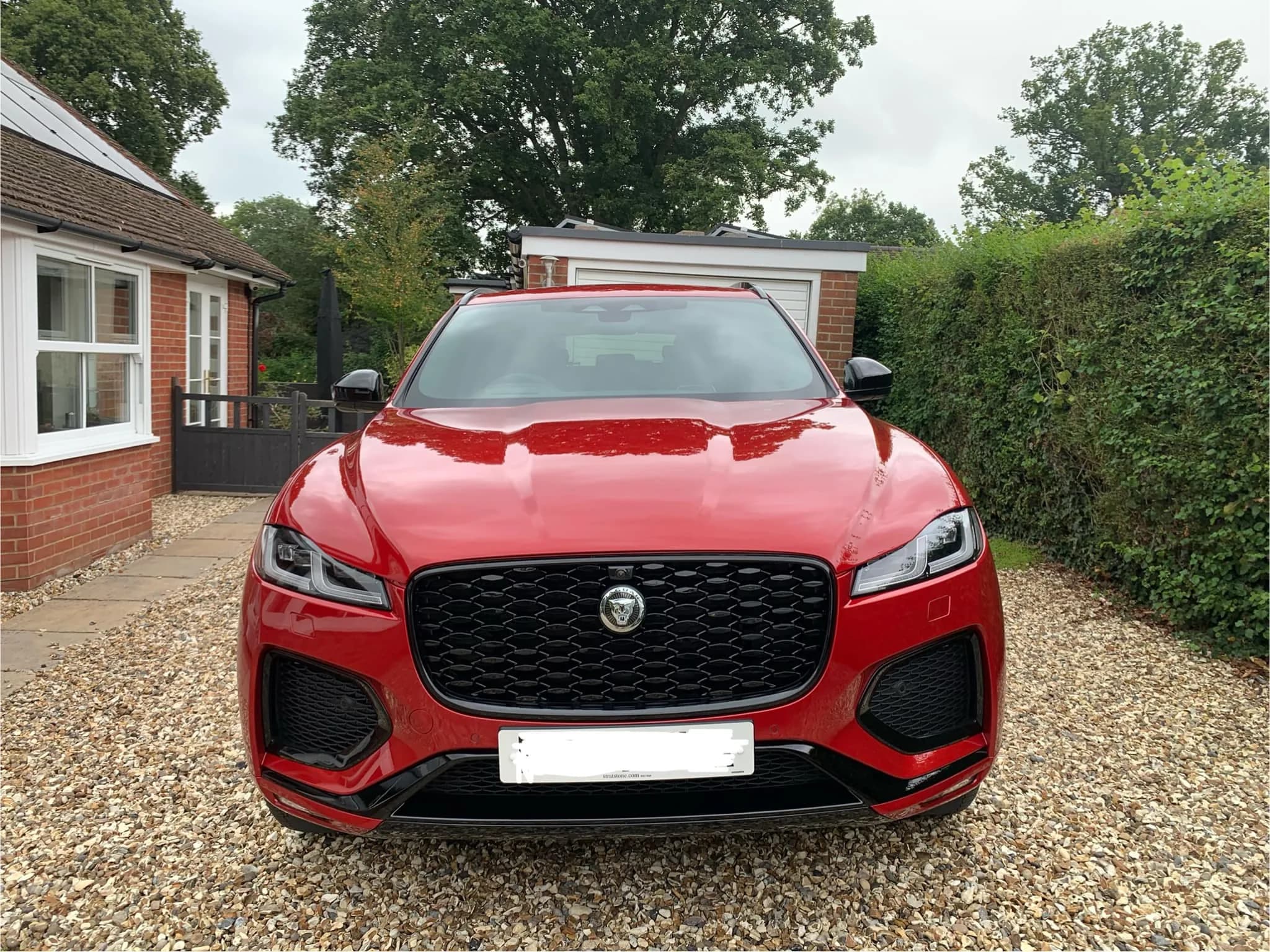 Red car photographed outdoors